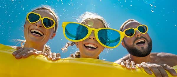 Mother, daughter and father with sunglasses