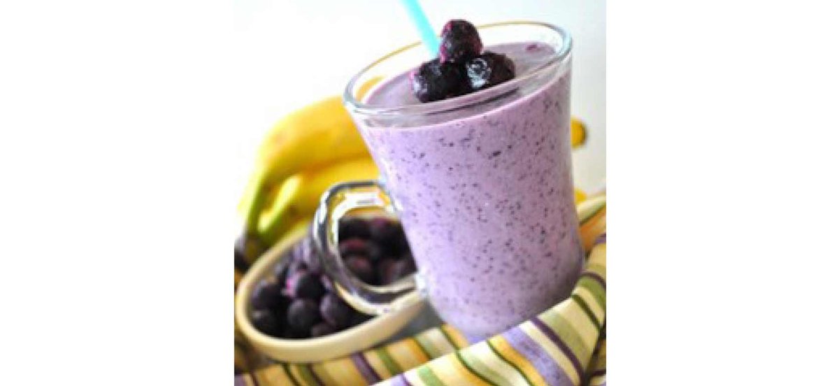 Blueberry smoothie in clear glass