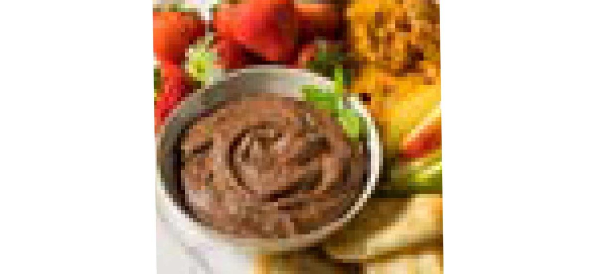 Bowl of brownie batter dip with fruit