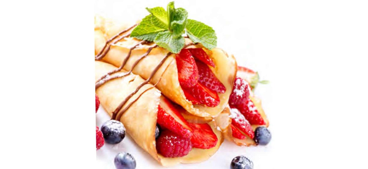 Strawberry crepes with blueberries and mint