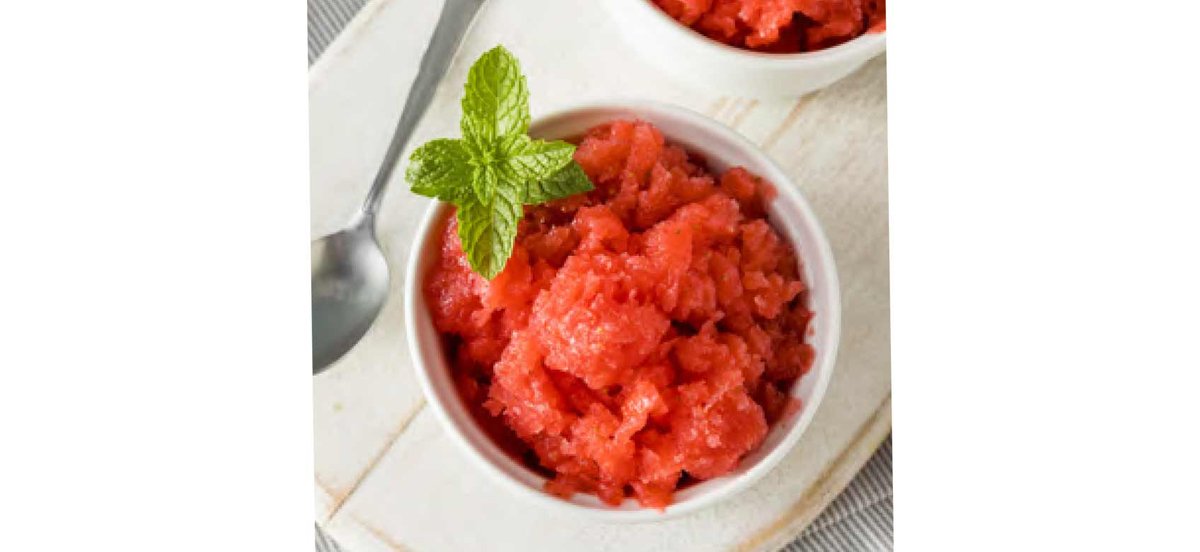 Bowl of strawberry granita with mint