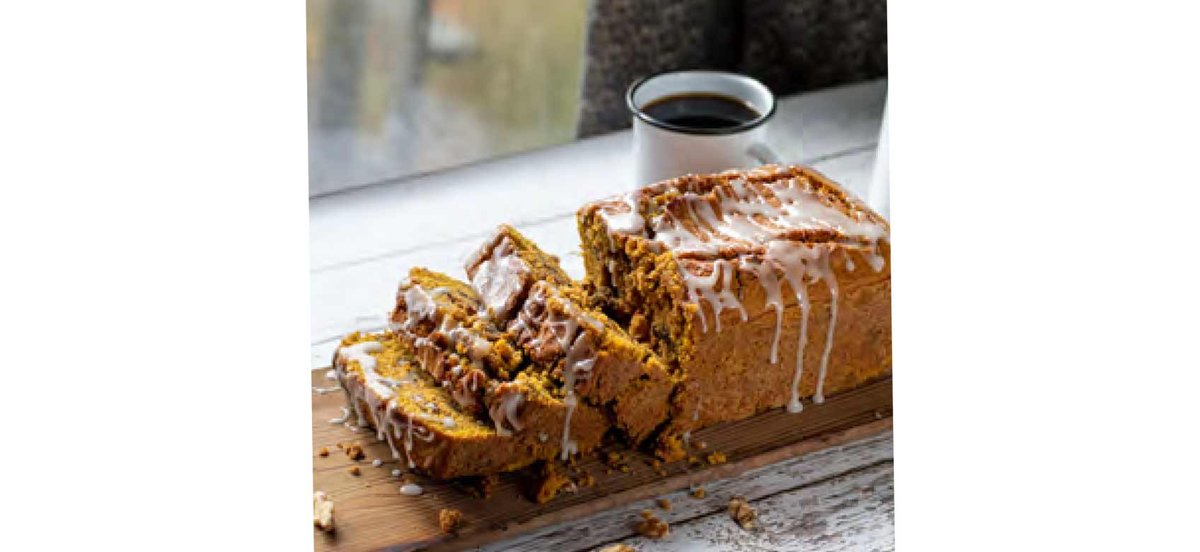 Sliced pumpkin bread with cup of coffee