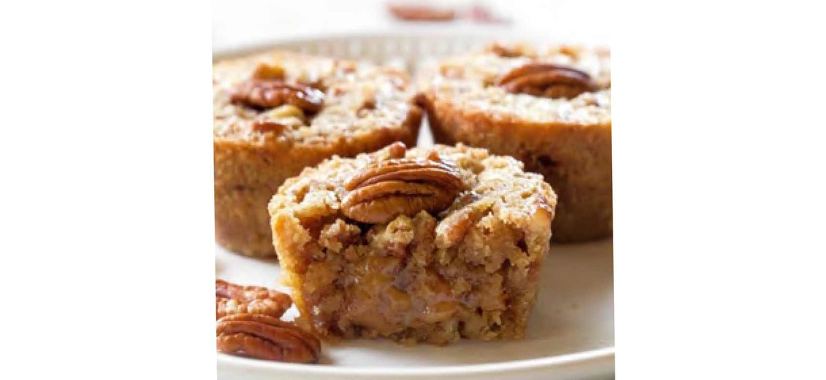 Pumpkin muffins with pecans on a plate